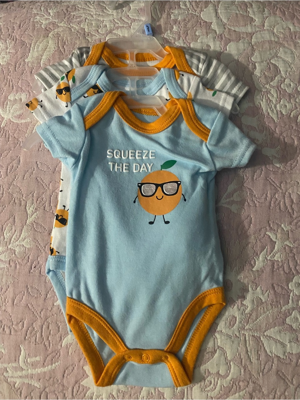 Kidgets Light Blue One-Piece Bodysuit with Orange Trim and Orange Graphic